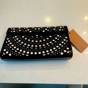 Alaia clutch never used w tags.